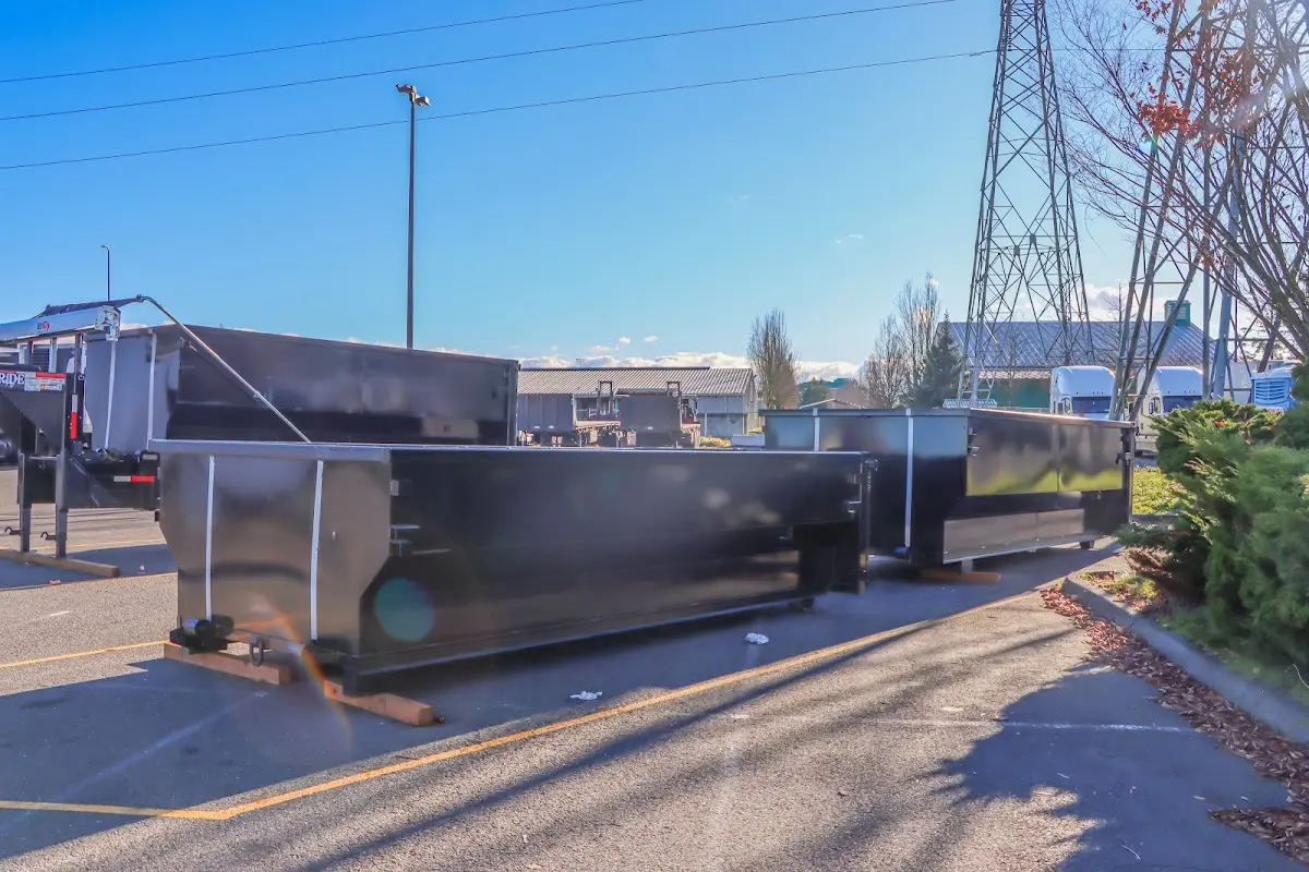 Roll-off dumpster ready for waste disposal at job site for 12 Yard Dumpster Rental in Gardiner
